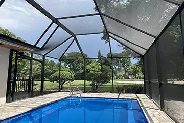 Mansard style pool enclosure by East Coast Aluminum